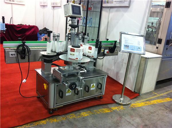 Campo de bebidas de la máquina de etiquetado de la etiqueta engomada redonda de la etiqueta engomada de la botella del jugo de la fruta del dragón de Hami