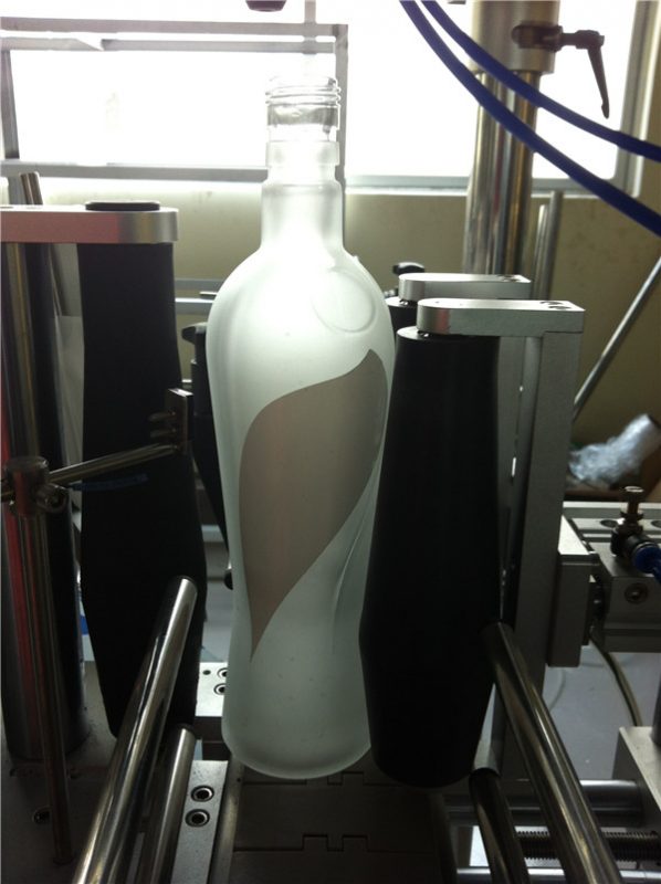 Tipo impulsado eléctrico de la máquina de etiquetado de la etiqueta engomada redonda de la botella de la industria de bebidas