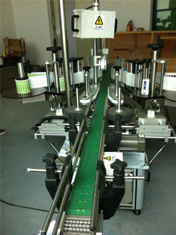 Aplicador de etiquetas adhesivas Pudao de gran marca, máquina de etiquetado de vinos / aplicador de etiquetas de botellas de cerveza